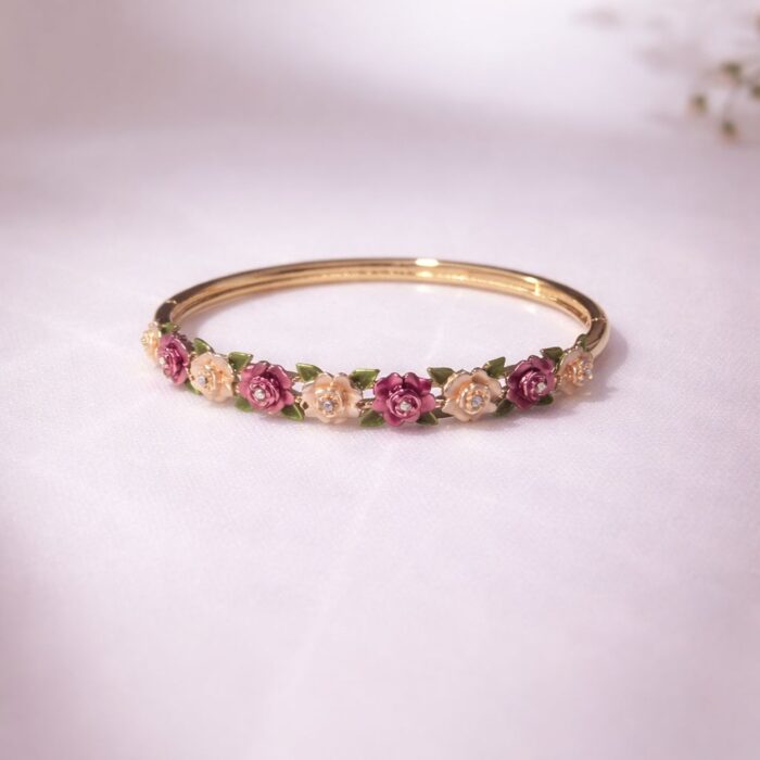 A timeless keepsake for the modern romantic Embrace the charm of a bygone era with The Heirloom Rose bangle.