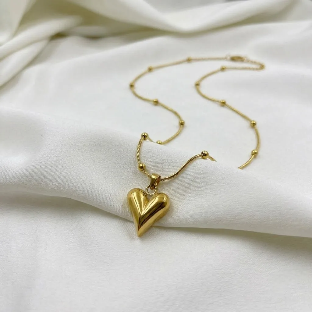 Gold Beaded Snake Heart Necklace